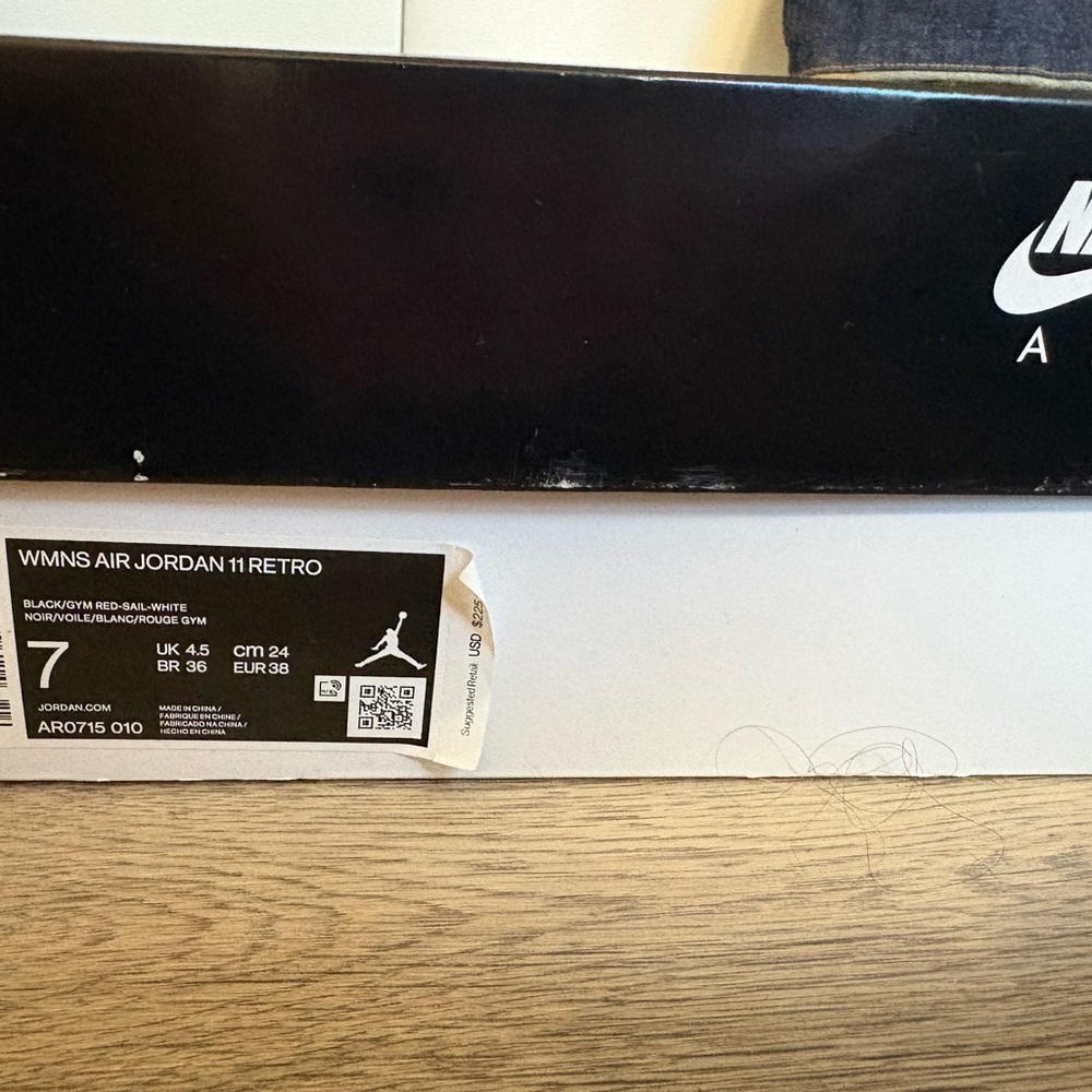 Jordan Air 11 Retro Black and Red Sneakers - Picture 3 of 3